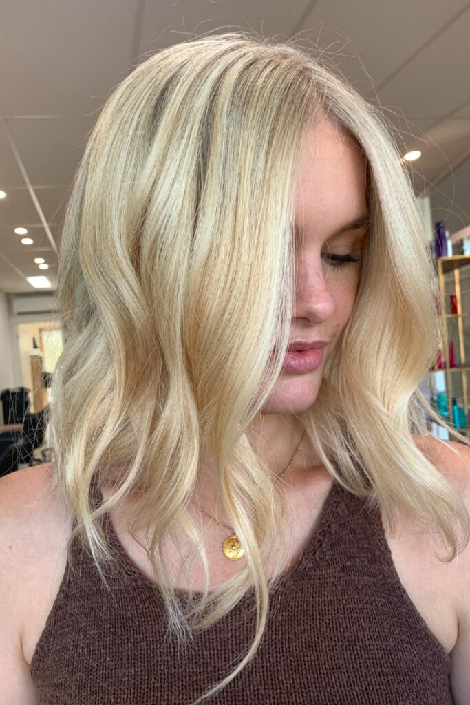 Golden-toned blonde colour with soft dimensional highlights